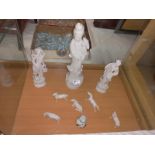A quantity of Japanese figures and horses etc