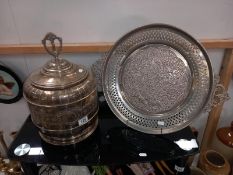An inlaid metal tray and large inlaid metal jar with lid.