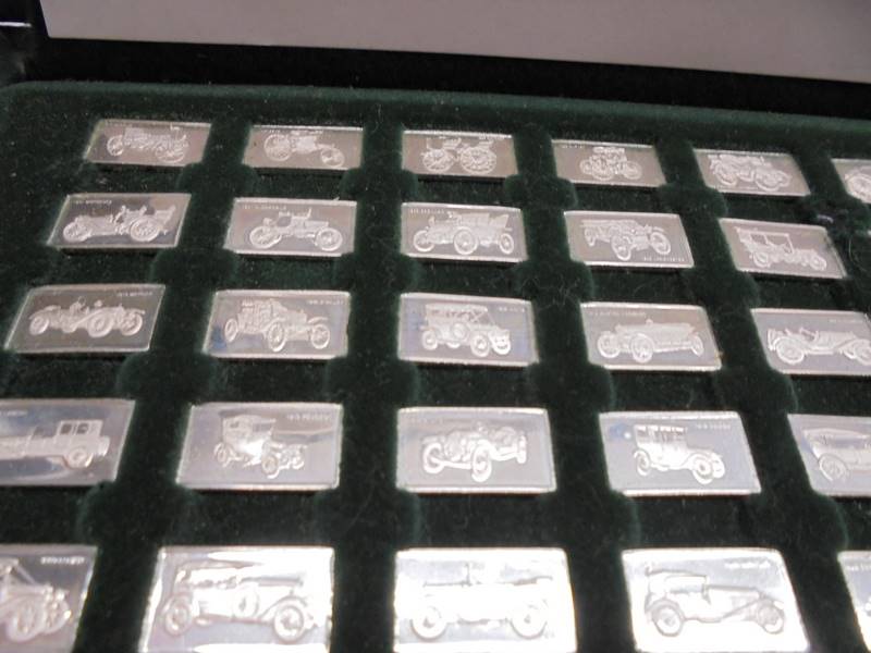A cased set of vintage sterling silver ingots, 1976. 100 Greatest cars of 1875 - 1975. - Image 2 of 5