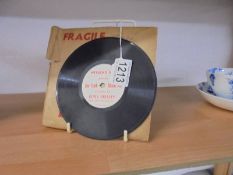 A rare 6" 78rpm Weekend Mail 'The Truth About Me' Elvis Presley record.