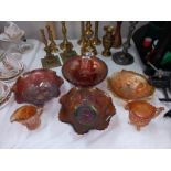 A quantity of mostly orange iridescent carnival glass