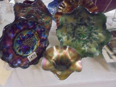 Seven assorted carnival glass dishes including rare colours.