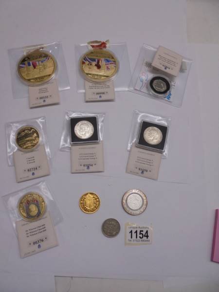 Two VE day coins, Two George V half crown, Winston Churchill coin, Concorde coin etc.,