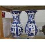 A pair of Italian Chinese style blue and white vases. 26 cm tall.