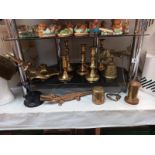 A good selection of brassware including candlesticks, ink well & plane ornaments etc.