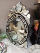 An ornate Gypsy style mirror