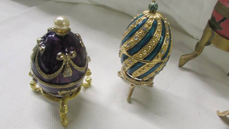 Four decorative egg shaped pill boxes, Cloissonne' egg, 3 egg tree baubles & 2 Cloissonne' purses. - Image 3 of 5