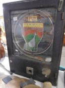 A vintage 'Get the Ball Past the Arrow' slot machine.