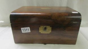 A Victorian mahogany writing box with one inkwell.