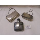 Two Victorian silver purses and a silver hip flask.
