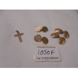 A pair of 9ct gold cuff links, 5.5 grams, a pair of 10ct gold cuff links, 8.8 grams and a 9ct cross.