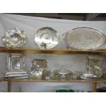 Two silver plate trays, 3 silver plate tureens, 3 silver plate baskets, a silver plate tea set,