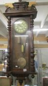 A Victorian mahogany double weight Vienna wall clock. COLLECT ONLY.