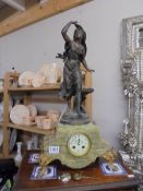 A French marble and ormolu mantel clock surmounted female figure, in working order. COLLECT ONLY.