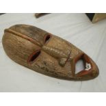 An African ceremonial mask, 67 x 20 cm.