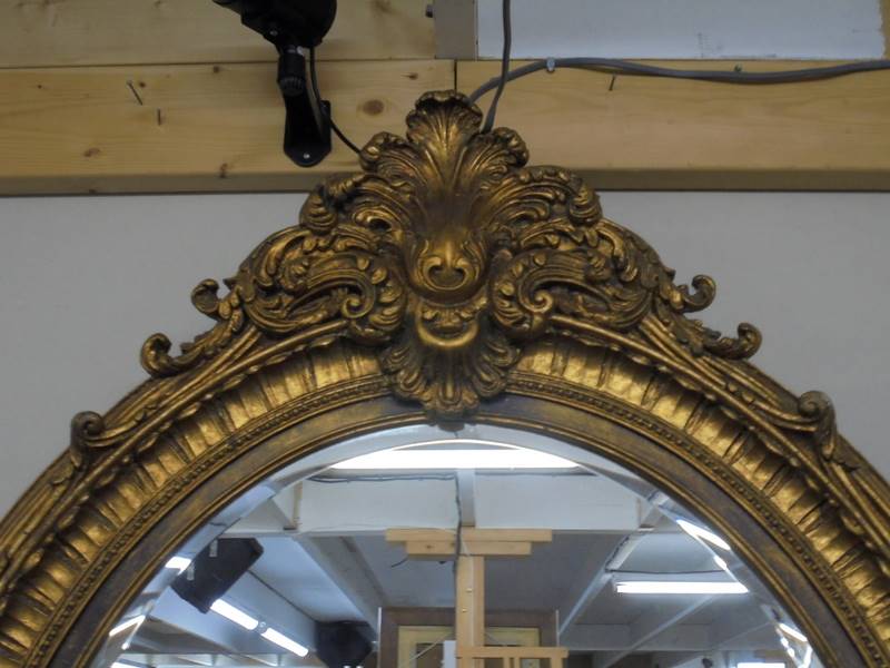 A large oval bevel edged mirror in gilded frame COLLECT ONLY. - Image 2 of 2