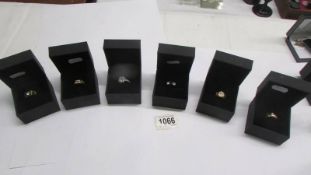 Six boxed 'Tru Diamonds' dress rings.