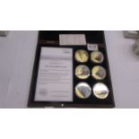 A cased set of '250 years of HMS Victory' coins with certificate.