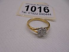 An 18ct yellow gold seven stone diamond ring, size L half, 2.6 grams.