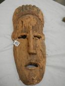 A well worn African Dan style mask, 53 x 18 cm.