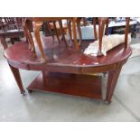 A Victorian mahogany wind out table with inlaid legs & 2 leaves