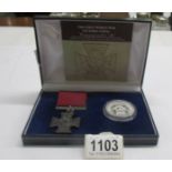 A cased 'The First World War' Victorian Cross commemorative.