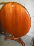 A Victorian mahogany circular dining table. COLLECT ONLY.