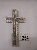 A mother of pearl crucifix.