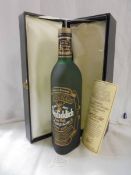 A boxed bottle of centenary Glenfiddich Scotch whisky.