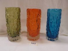 Three whitefriars bark vases, blue, tangerine and green. (All approximately 19cm tall)