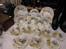 Approximately thirty pieces of pictorial china tea ware, COLLECT ONLY.