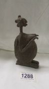A small bronze African figure, 14cm tall, age unknown.