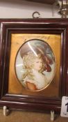 A framed and glazed miniature portrait of a lady.