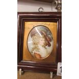 A framed and glazed miniature portrait of a lady.