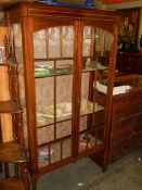 A good Edwardian mahogany inlaid two door display cabinet. COLLECT ONLY.