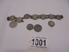 A silver coin bracelet, a/f, 20 grams.
