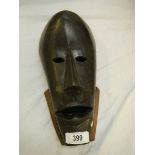 A West African style war mask, 40 x 19 cm.
