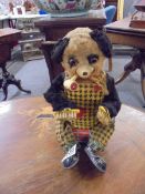 A mechanical shoe shine bear.