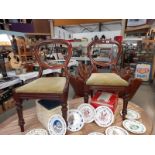 A pair of Victorian mahogany balloon back chairs