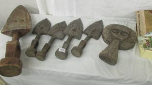 Six tribal wooden items possibly crop/fertility gods.