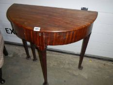 A Victorian D shaped pad foot fold over writing table. COLLECT ONLY.