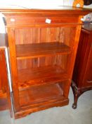 A 20th century mahogany bookcase. COLLECT ONLY.