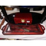 A red lacquered oriental jewellery box, a tray & letter opener