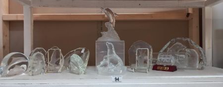 A quantity of moulded frosted glass animal image paperweights and ship in a bottle etc