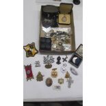 A mixed lot of assorted badges and buttons etc.,