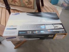 A Samsung smart blu-ray 3D player, new in sealed box.