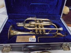 A good quality cased cornet presented in the memory of Edward Mosely, 31-12-97.