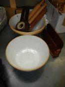 A large mixing bowl, a barometer and other wooden items.