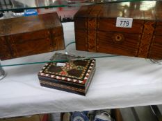 Three mahogany boxes including inlaid examples.