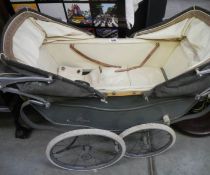 A vintage Royale twin pram in need of restoration. COLLECT ONLY.